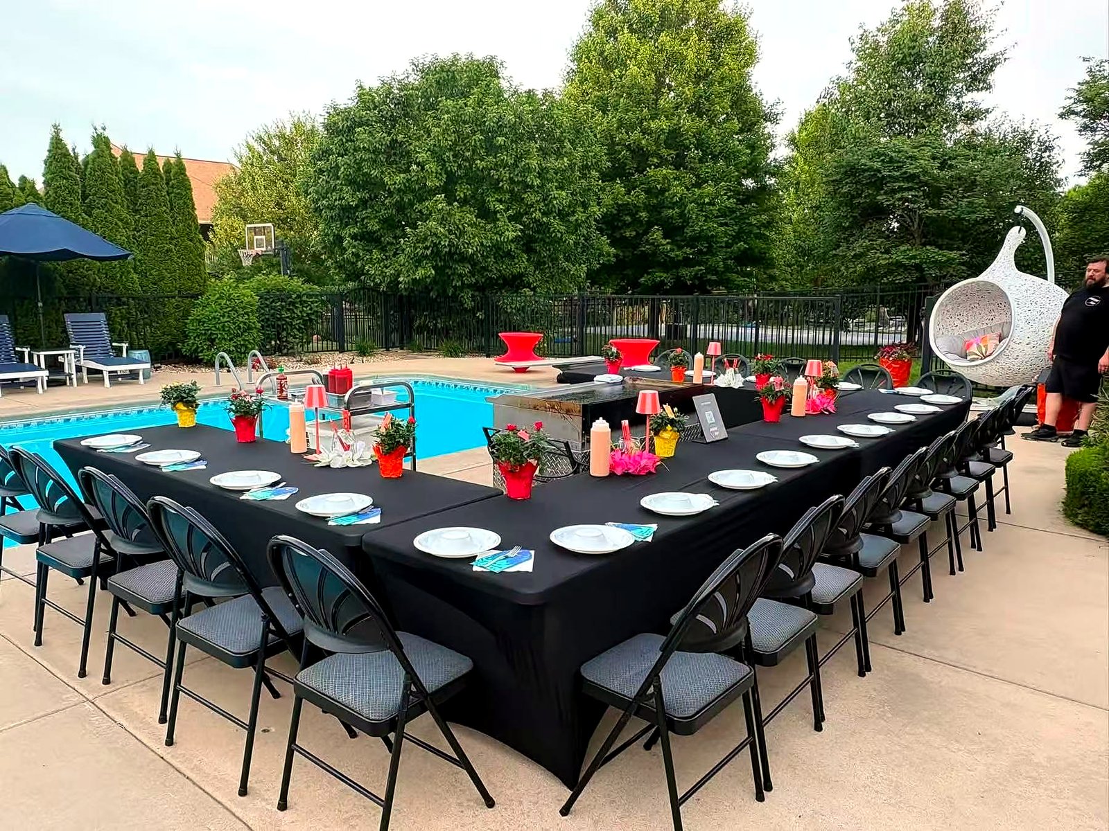 Long dinner table at a backyard hibachi party in Riverside
